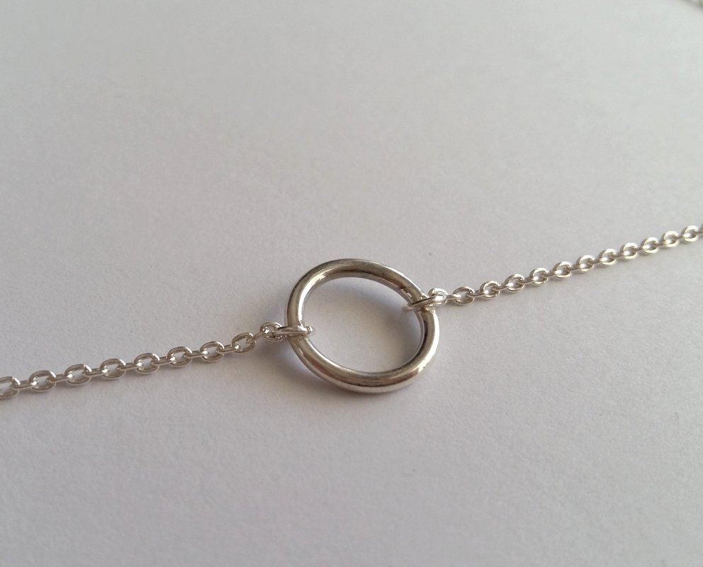 Silver Karma Ring Necklace